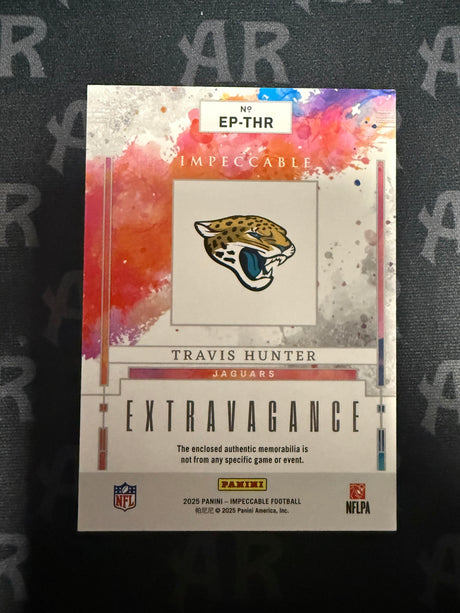 2025 Panini Impeccable #EP-THR Travis Hunter Extravagance Patch Silver /25